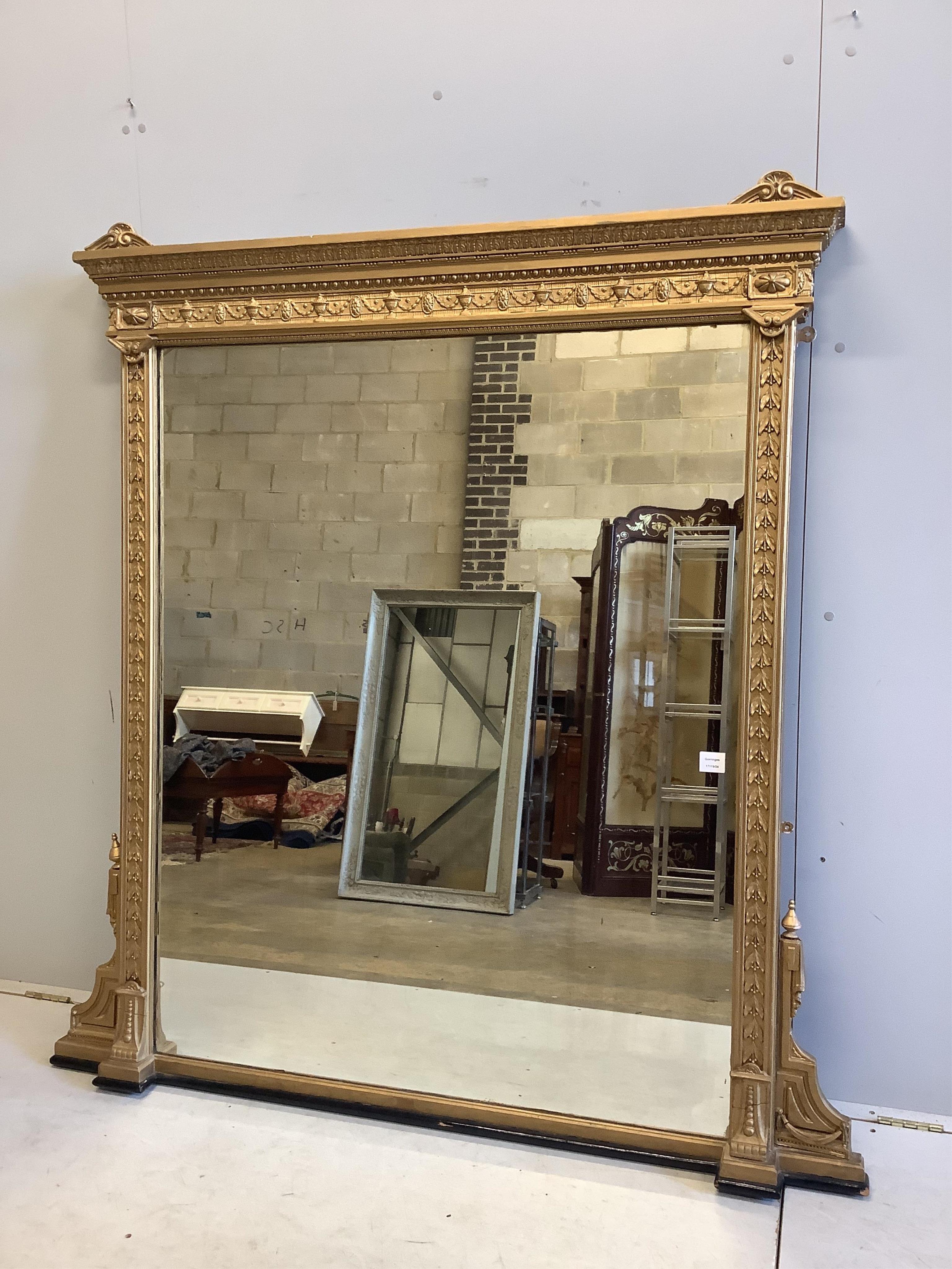 A Victorian giltwood and composition overmantel mirror, width 146cm, height 160cm. Condition - fair, re-gilded